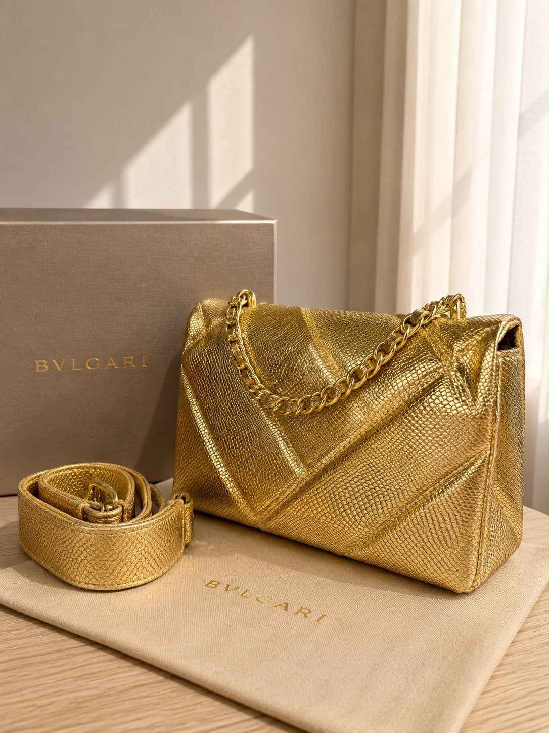 luxurious Python Leather Serpenti Cabochon Cross-Body Bag by Bvlgari