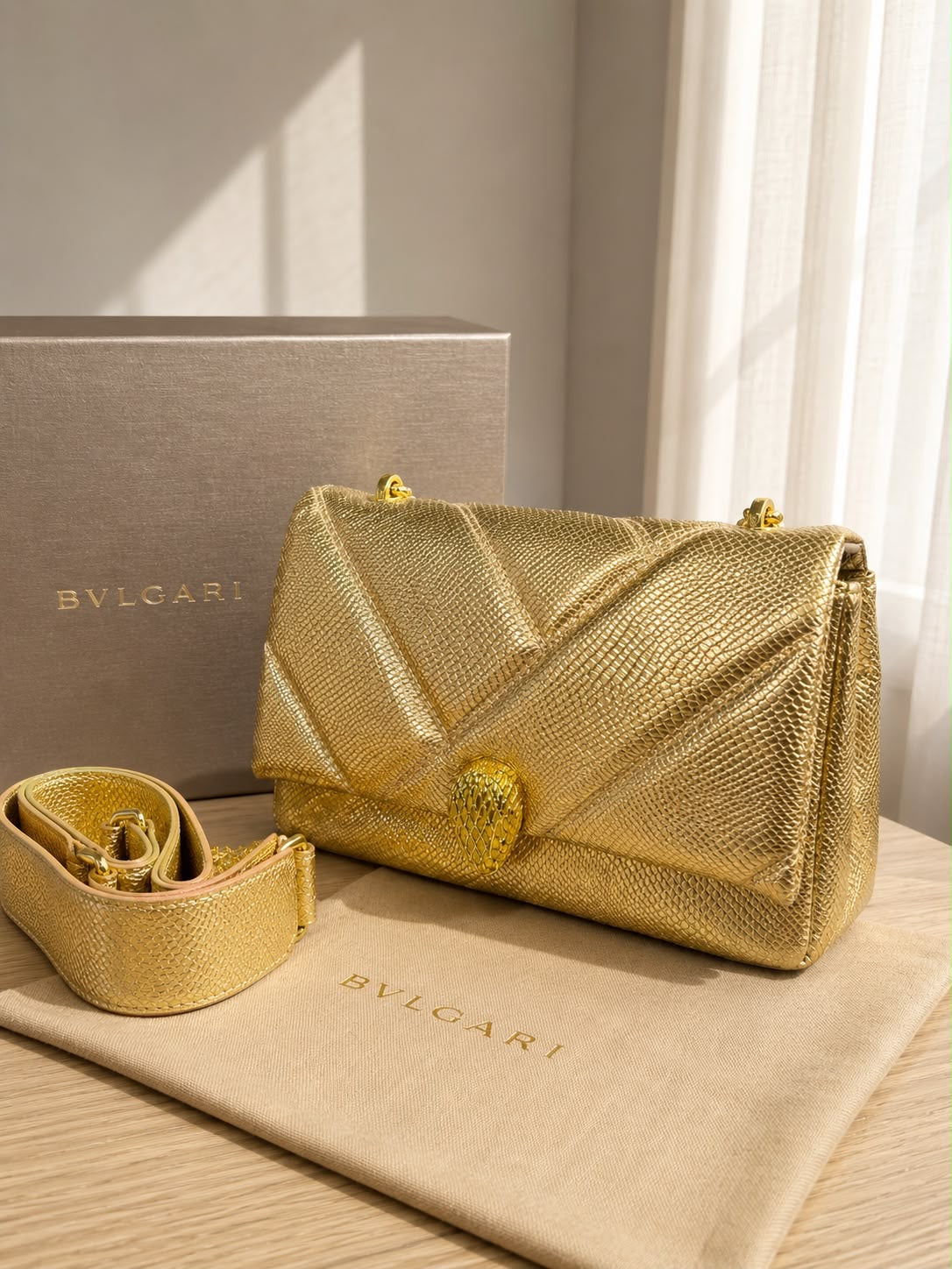 luxurious Python Leather Serpenti Cabochon Cross-Body Bag by Bvlgari