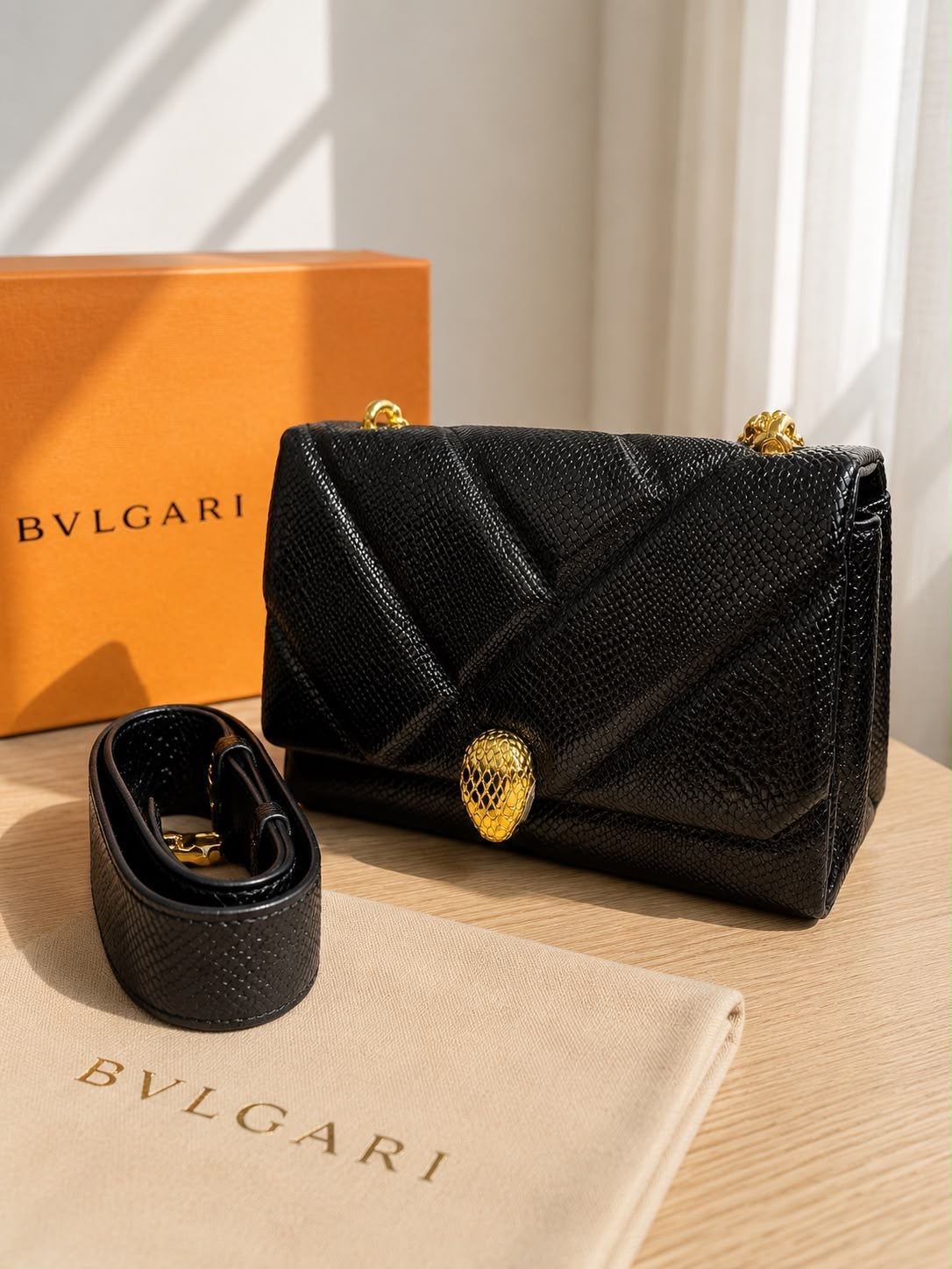 luxurious Python Leather Serpenti Cabochon Cross-Body Bag by Bvlgari